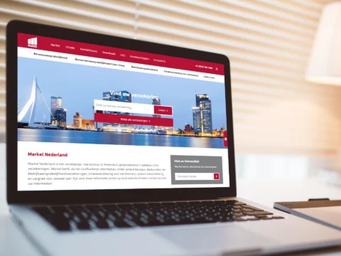 Impressie van homepage Markel Insurance op een scherm.